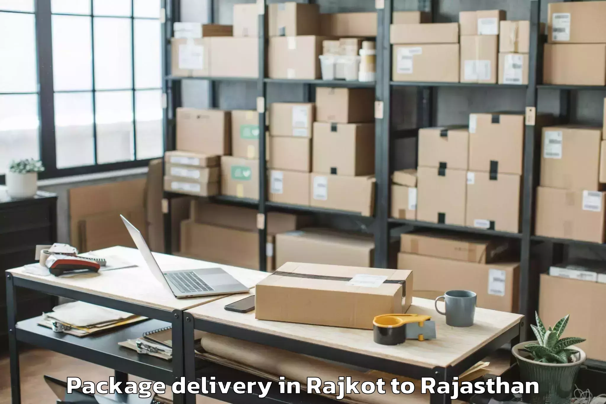 Top Rajkot to Shahpura Package Delivery Available